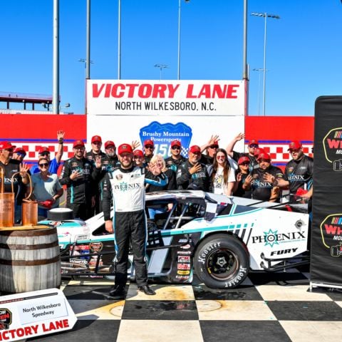 Justin Bonsignore celebrates after winning Sunday's Brushy Mountain Powersports 150 NASCAR Whelen Modified Tour race.