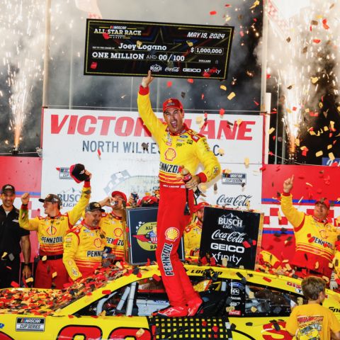 Joey Logano celebrates after winning Sunday's NASCAR All-Star Race at North Wilkesboro Speedway. 